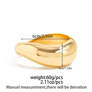 Polished gold drop-shaped cuff bracelet showing size 6cm diameter and 3cm width details
