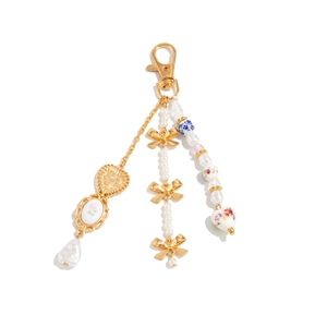 Vintage floral ceramic heart keychain with gold bow charms and elegant white pearls