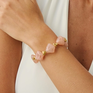 Close-up of pink marble resin beads and golden square spacers on this stylish choker necklace