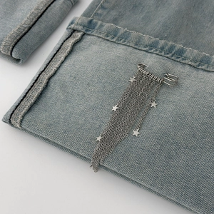 DIY silver star tassel safety pin brooch with multi-layer chains on blue denim fabric
