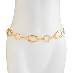 Close-up of golden hollow oval and circular metal links on a stylish waist chain belt