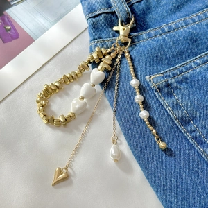 Minimalist gold and pearl layered pant chain with ceramic hearts for bags and keys