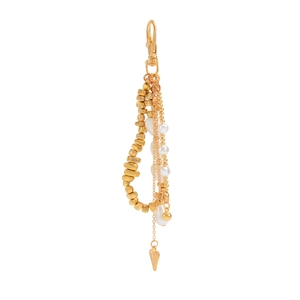 Golden keychain with faux pearls and heart charms for bags and keys in minimalist style