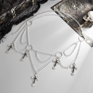 Close-up of gothic silver waist chain with hollowed cross pendants and black lace details