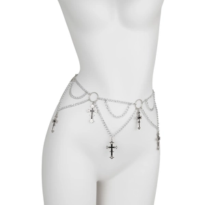 Close-up of gothic silver waist chain with black cross pendants on a female mannequin