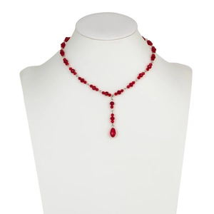 Detail of Gothic red crystal blood drip necklace with faceted beads on a mannequin neck