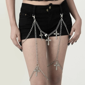 Gothic silver body chain with layered metal cross pendants and hip tassels on black attire
