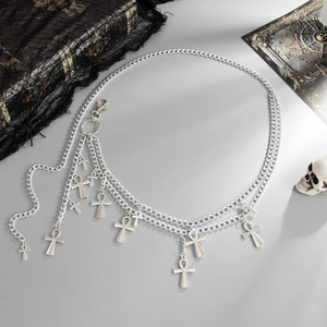 Silver layered waist chain with Ankh cross pendants on a dark gothic background