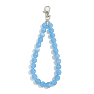 Close-up of light blue beaded chain accessory with glossy beads and silver lobster clasp