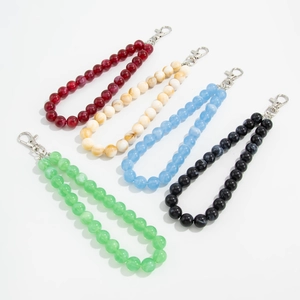 Acrylic marble patterned beaded bag charms in assorted colors with silver lobster clasps