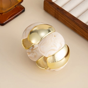 Artistic stretch bracelet with chunky acrylic marble blocks and gold metal links