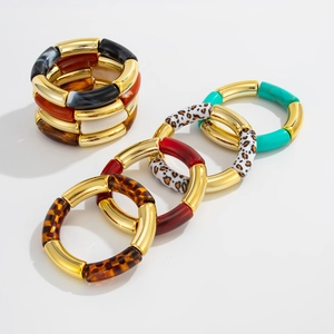 Pulseras elásticas estilo bambú de resina con estampado de leopardo y metal dorado