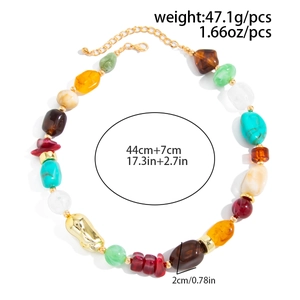 Detail of colorful resin beads necklace with golden lobster clasp and adjustable chain