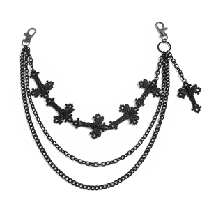 Detail of gothic matte black layered pants chain with metallic cross charms and lobster clasps
