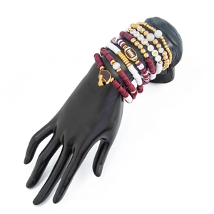 Detail of Game Day stretch bracelet set featuring football helmet charm and clay beads