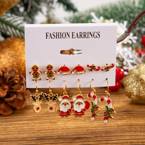 Festive Christmas earring set with 6 pairs of Santa, reindeer, and gingerbread designs