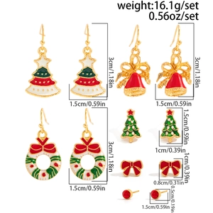 Detailed view of six pairs of Christmas earrings with dimensions and enamel details