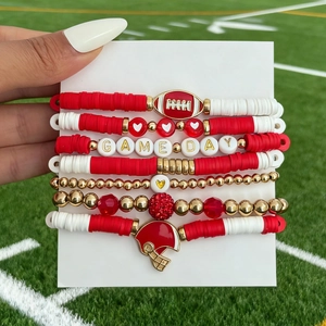 Detail of 7pcs GAME DAY football charm bracelets with red heishi beads and gold accents