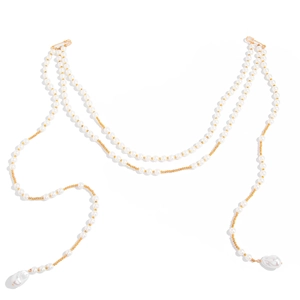Multi-layer pearl body chain with gold beads and baroque pearl pendants on white background