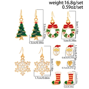 Detailed view of Christmas themed earring set with dimensions and weights for each piece