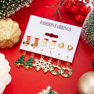 Detailed view of 6-pair Christmas earring set with reindeer, snowflakes, and festive motifs