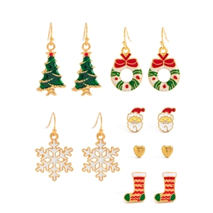 Detailed set of six pairs of Christmas earrings featuring Santa and snowflake motifs
