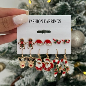 Detail of 6-pair Christmas earring set with Santa, reindeer and candy cane charms