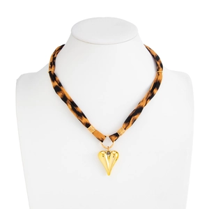 Leopard print scarf necklace with a polished gold heart pendant on a white model bust