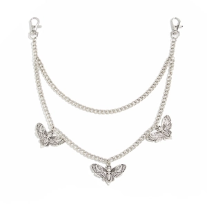 Gothic silver layered pant chain featuring skull moth pendants and metal lobster clasps