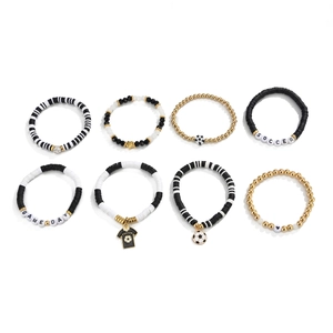 Detail view of 8pcs soccer theme bracelets with acrylic beads and sport pendants