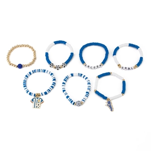 Detail of soccer theme bracelet set with blue acrylic beads and sports charms