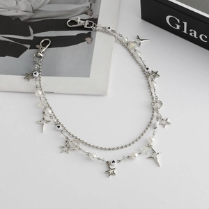 Double-layered punk style trousers chain with metal stars and white pearl accents