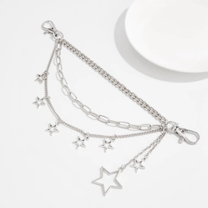 Detail of silver multi-layered star chain with lobster clasps for bags and waist