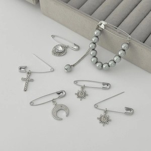 6pcs silver heart and pearl brooch set with crystal charms on white background