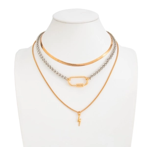 Detail view of multi-layered hip hop necklace with horseshoe clasp and star pendant