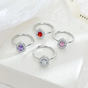 Elegant silver halo ring set with colorful pear-cut zircon stones in red, pink, and purple