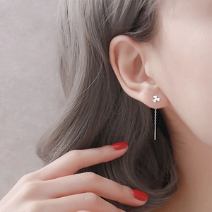Elegant S925 sterling silver clover drop earrings with long chain on model