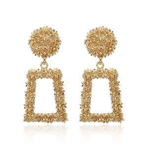 Vintage oversized gold geometric earrings featuring textured rounds and rectangle frames
