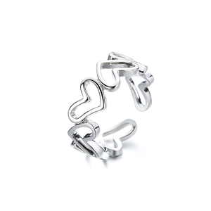 Minimalist silver open ring featuring hollow heart shapes with a polished metallic finish