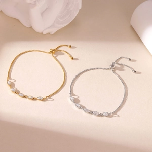 Pulseras ajustables de acero de titanio oro y plata con circonitas de corte marquesa