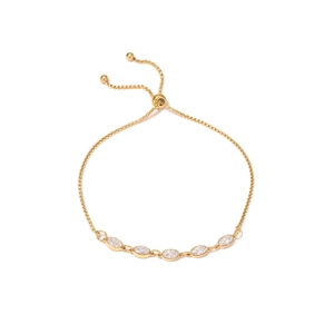 Elegante pulsera de acero de titanio dorado con cinco circonitas ovales y cierre ajustable