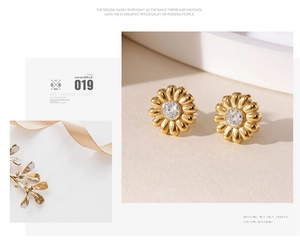 Detailed view of daisy stud earrings featuring a clear zircon center on a gift-themed backdrop