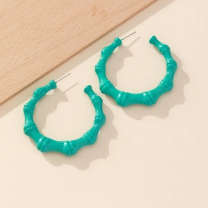 Exaggerated C-shaped blue bamboo texture hoop earrings with metallic paint finish