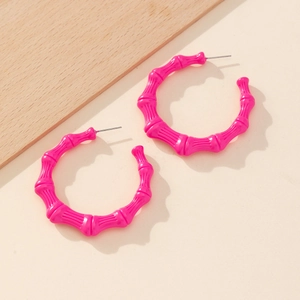 Exaggerated hot pink bamboo joint hoop earrings with stylish geometric metal C-shape