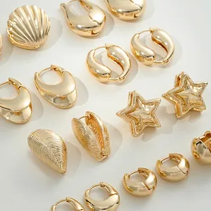 Golden 14K plated shell and star drop earrings with polished minimalist hoop design