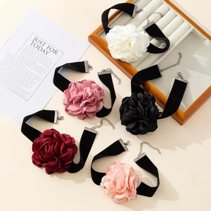 Oversized velvet rose choker in multiple colors including burgundy and black