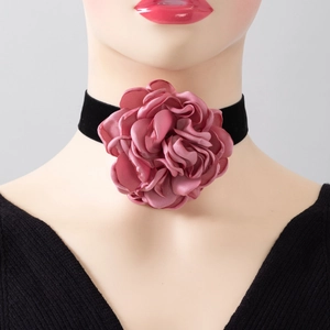 Oversized pink fabric flower choker necklace with black velvet band for elegant styling