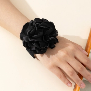 Elegant black satin rose wrist corsage with layered petals for wedding and prom events