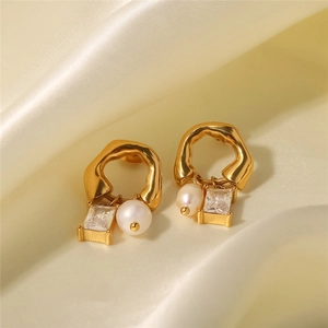 French vintage earrings with gold rings, white pearls and square clear zircon insets