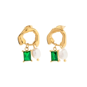 Detail of vintage gold earrings with emerald green zircon and baroque pearl charms